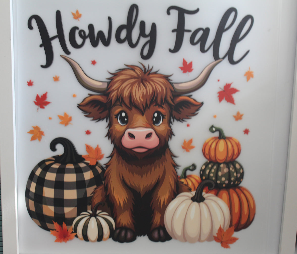 Cow with pumpkins