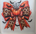 Orange and Tiger print Bow with bats and pumpkin.