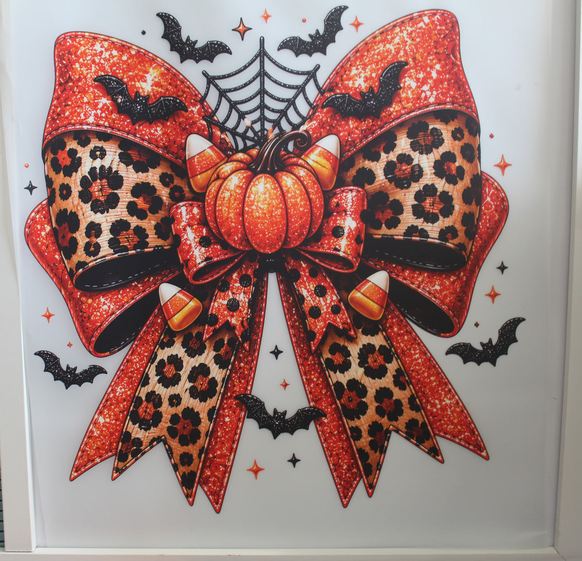 Orange and Tiger print Bow with bats and pumpkin.