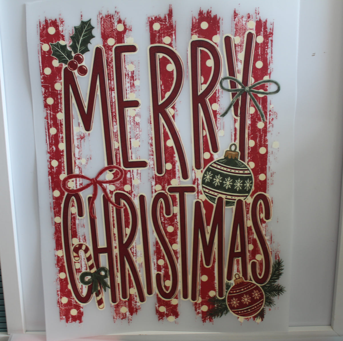 Merry Christmas with holly and orniments